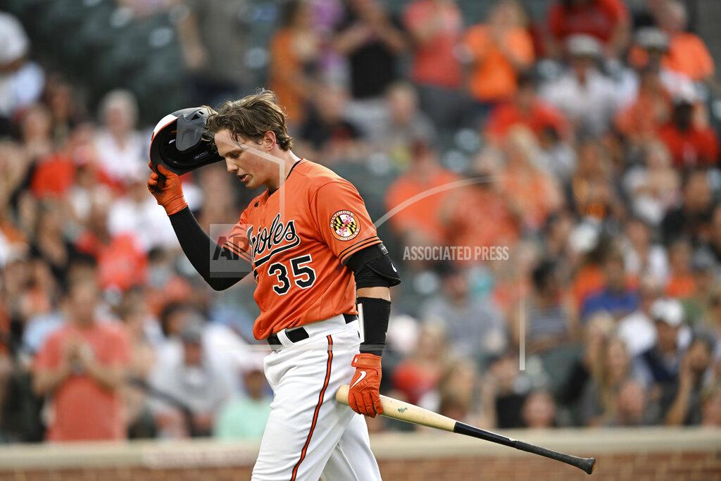 Gail Burton Baltimore Orioles' Adley Rutschman walks to the dugout after striking out against the Tampa Bay Rays during the second inning of a baseball game Saturday, May 21, 2022, in Baltimore. (AP Photo/Gail Burton)