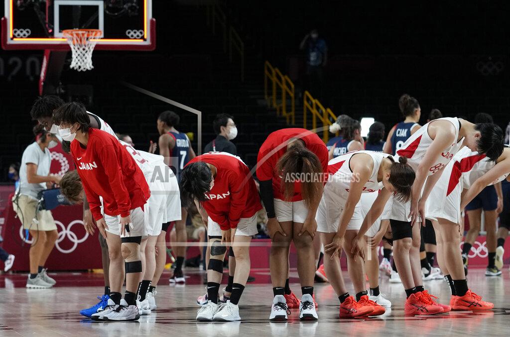 Eric Gay Members of team Japan bow after their win in the women's basketball preliminary round game against France at the 2020 Summer Olympics, Tuesday, July 27, 2021, in Saitama, Japan. (AP Photo/Eric Gay)