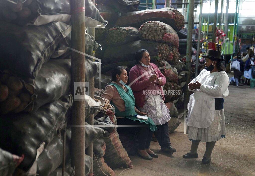 Martin Mejia Indigenous women speak to each other in the Quechua Indigenous language at the Nery Garcia Market in Huamanga, Peru, Thursday, Sept. 2, 2021. Quechua is spoken by an estimated 10 million people in the region, largely in Peru, Ecuador and Bolivia. (AP Photo/Martin Mejia)
