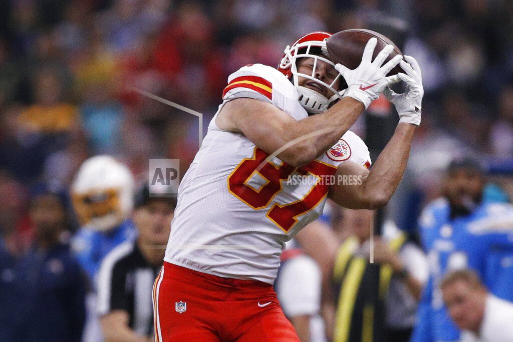 Rebecca Blackwell Kansas City Chiefs tight end Travis Kelce hauls in a pass against his helmet during the first half of an NFL football game against the Los Angeles Chargers Monday, Nov. 18, 2019, in Mexico City. (AP Photo/Rebecca Blackwell)