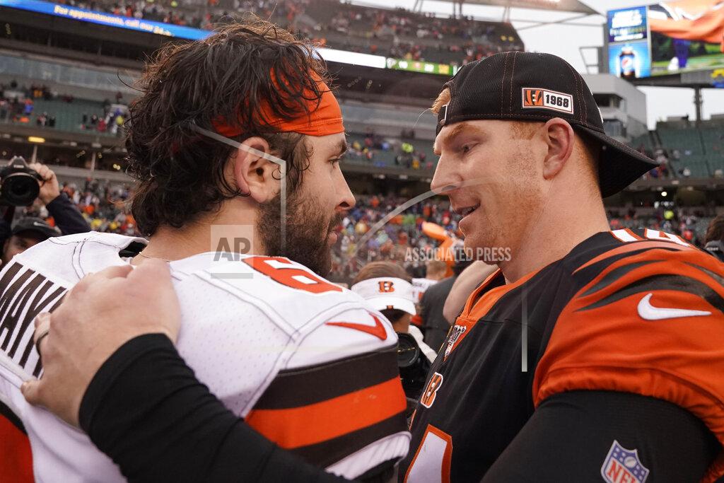 Bryan Woolston Cincinnati Bengals quarterback Andy Dalton, right, and Cleveland Browns quarterback Baker Mayfield talk after the Bengals defeated the Browns in an NFL football game, Sunday, Dec. 29, 2019, in Cincinnati. (AP Photo/Bryan Woolston)