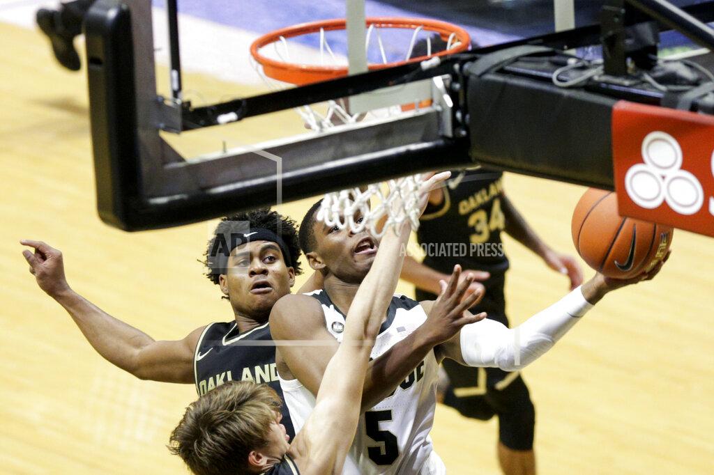 Nikos Frazier Purdue guard Brandon Newman (5) goes up for a layup during the first half of an NCAA college basketball game against Oakland Tuesday, Dec. 1, 2020 in West Lafayette, Ind. (Nikos Frazier/Journal & Courier via AP)