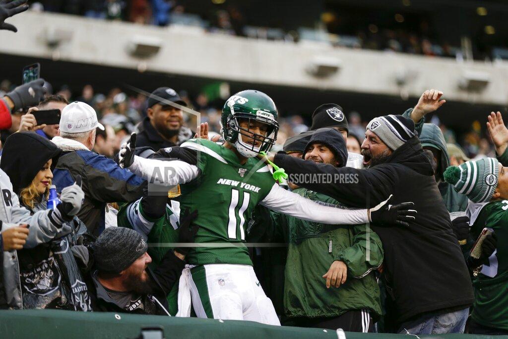 Adam Hunger New York Jets wide receiver Robby Anderson (11) celebrates with fans after scoring a touchdown during the second half of an NFL football game against the Oakland Raiders Sunday, Nov. 24, 2019, in East Rutherford, N.J. The Jets won 34-3. (AP Photo/Adam Hunger)