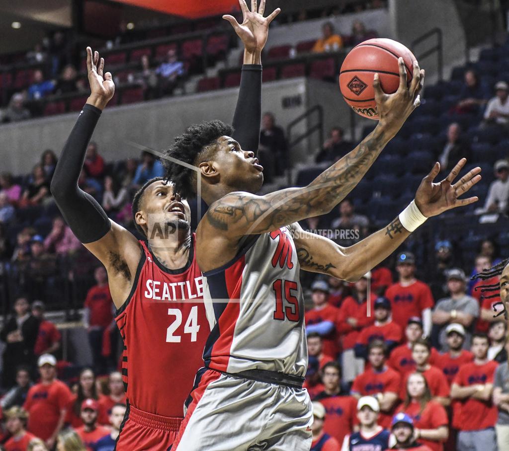 Bruce Newman Mississippi guard Luis Rodriguez (15) scores next to Seattle guard Delante Jones (24) during an NCAA college basketball game Tuesday, Nov. 19, 2019, in Oxford, Miss. (Bruce Newman/The Oxford Eagle via AP)