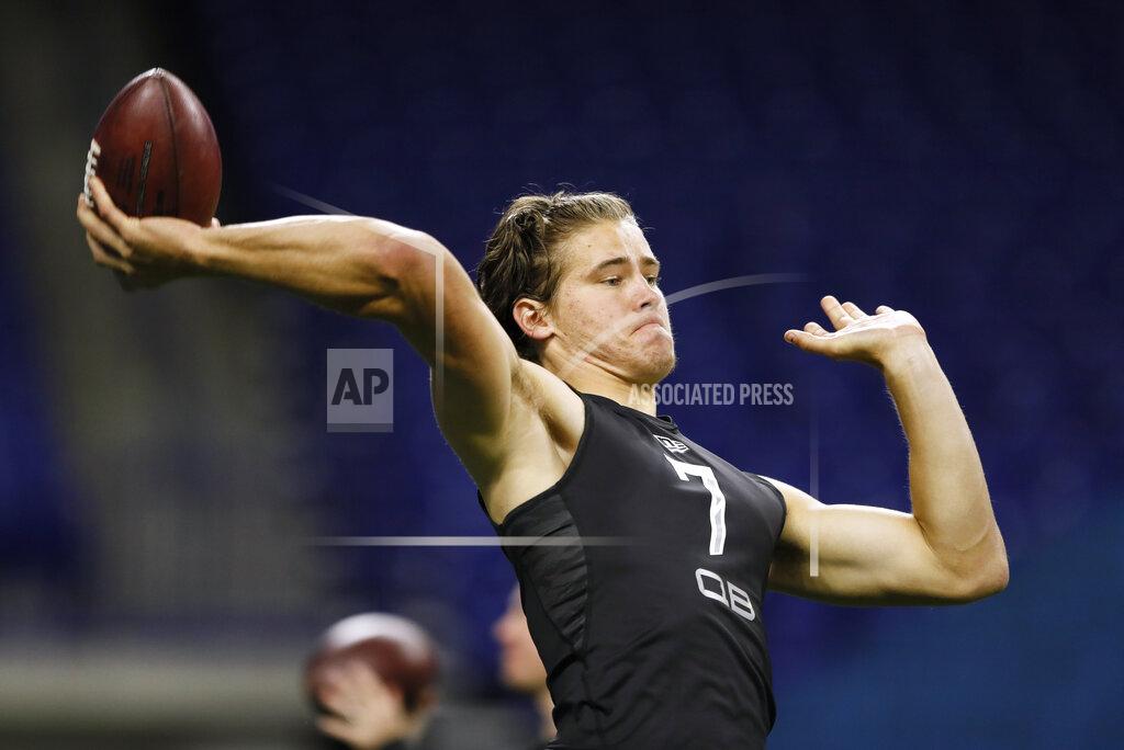 Charlie Neibergall Oregon quarterback Justin Herbert runs a drill at the NFL football scouting combine in Indianapolis, Thursday, Feb. 27, 2020. (AP Photo/Charlie Neibergall)