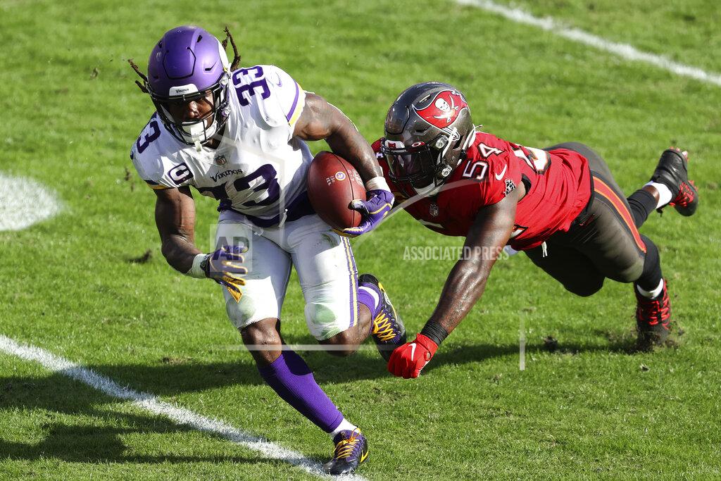 Mark Lomoglio during the second half of an NFL football game Sunday, Dec. 13, 2020, in Tampa, Fla. (AP Photo/Mark LoMoglio)