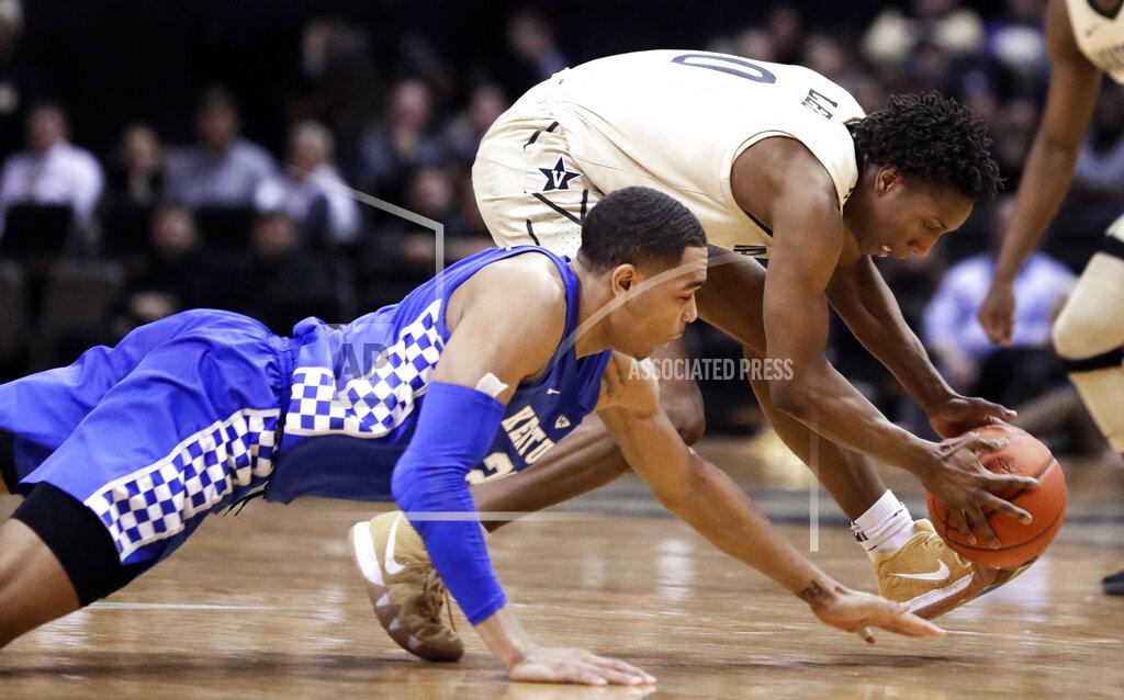 Mark Humphrey Kentucky forward PJ Washington and Vanderbilt guard Saben Lee (0) chase the ball during the second half of an NCAA college basketball game Tuesday, Jan. 29, 2019, in Nashville, Tenn. (AP Photo/Mark Humphrey)