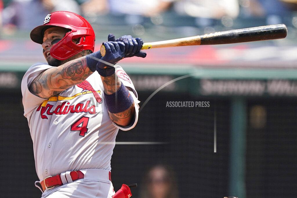 Tony Dejak St. Louis Cardinals' Yadier Molina hits an RBI-single in the first inning of a baseball game against the Cleveland Indians, Wednesday, July 28, 2021, in Cleveland. (AP Photo/Tony Dejak)