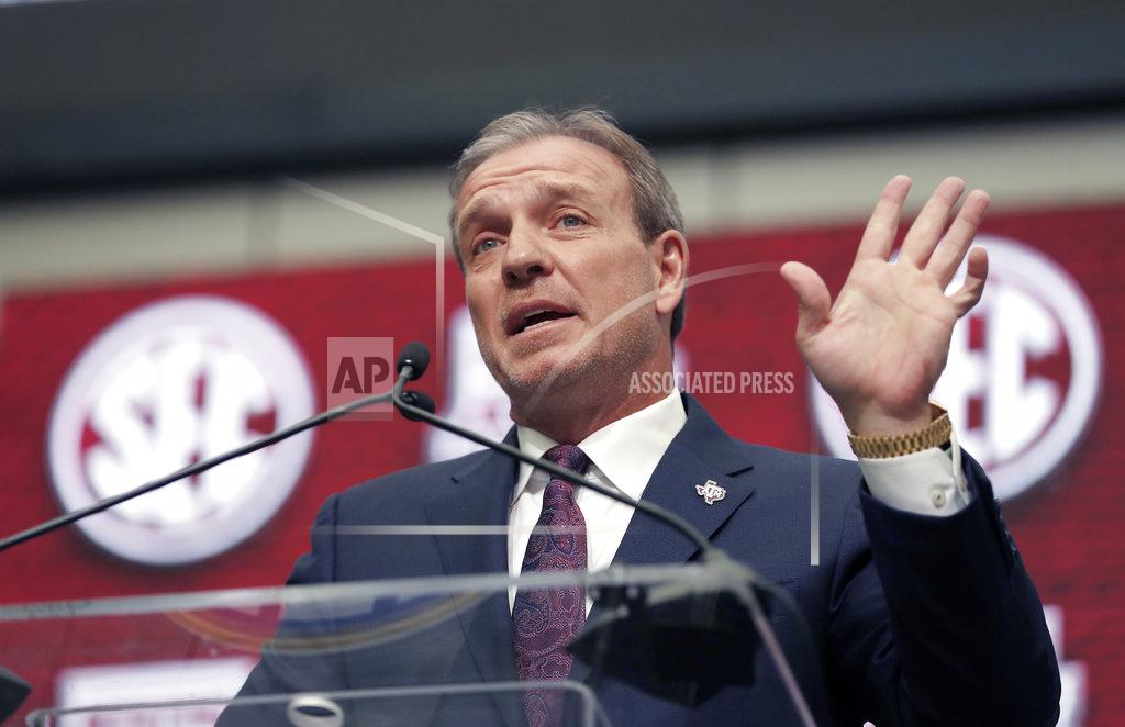 FILE - In this July 16, 2018, file photo, Texas A&M head coach Jimbo Fisher speaks at Southeastern Conference Media Days, in Atlanta. The arrival of an early signing period last year enticed the vast majority of last year’s top seniors to finalize their college plans in late December rather than waiting until February. Coaches and recruiting analysts expect that pattern to continue for the foreseeable future - and they’ve planned accordingly. “The way you go about your business has totally changed,” Texas A&M coach Jimbo Fisher said.(AP Photo/John Bazemore, File)
