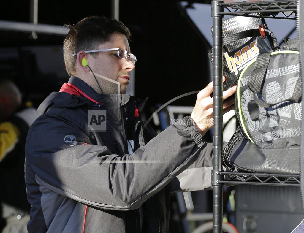 Terry Renna Jordan Taylor stores his gear after his turn to drive the Corvette C8.R car during the Rolex 24 hour auto race at Daytona International Speedway, Sunday, Jan. 26, 2020, in Daytona Beach, Fla. (AP Photo/Terry Renna)