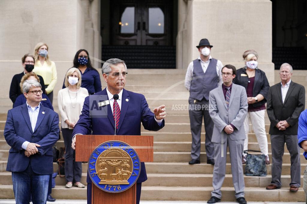 Brynn Anderson Georgia Secretary of State Brad Raffensperger speaks during a news conference on Wednesday, Nov. 11, 2020, in Atlanta. Georgia election officials have announced an audit of presidential election results that will trigger a full hand recount. (AP Photo/Brynn Anderson)