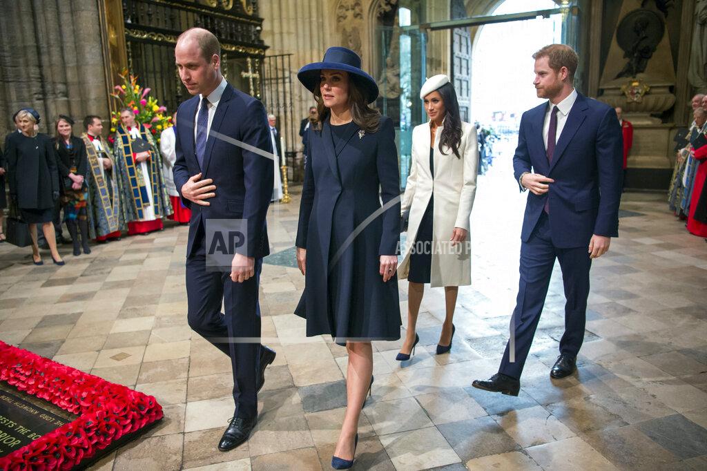 Paul Grover FILE - In this Monday, March 12, 2018 file photo, from left, Britain's Prince William, Kate the Duchess of Cambridge, Meghan Markle and Britain's Prince Harry arrive for the Commonwealth Service at Westminster Abbey. Britain and its royal family are absorbing the tremors from a sensational television interview with Prince Harry and Meghan. The couple said they encountered racist attitudes and a lack of support that drove Meghan to thoughts of suicide. The couple gave a deeply unflattering depiction of life inside the royal household, depicting a cold, uncaring institution that they had to flee to save their lives. Meghan told Oprah Winfrey that at one point “I just didn’t want to be alive anymore.” Meghan, who is biracial, said that when she was pregnant with son Archie, there were “concerns and conversations about how dark his skin might be when he’s born.” (Paul Grover/Pool Photo via AP, FIle)