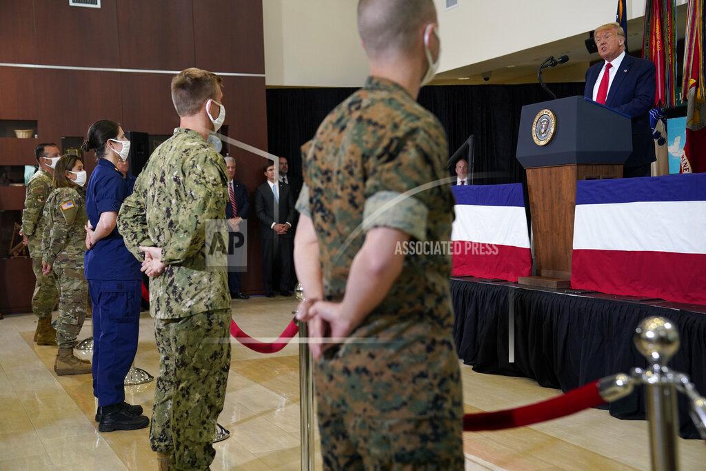 Evan Vucci President Donald Trump speaks about the counternarcotics operations at U.S. Southern Command, Friday, July 10, 2020, in Doral, Fla. (AP Photo/Evan Vucci)