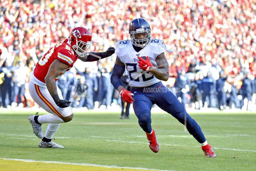 Ed Zurga FILE - In this Jan. 19, 2020, file photo, Tennessee Titans' Derrick Henry (22) runs for a touchdown past Kansas City Chiefs linebacker Anthony Hitchens (53) during the NFL AFC Championship football game in Kansas City. Derrick Henry signed his franchise tag for 2020, as the Titans will return nine offensive starters from 2019. (AP Photo/Ed Zurga, File)
