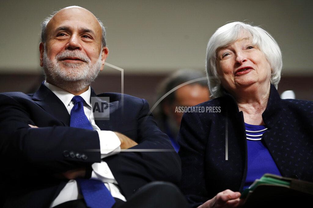 Jacquelyn Martin FILE - In this Nov. 7, 2017, file photo, former Federal Reserve Chair Ben Bernanke, left, and then-Federal Reserve Chair Janet Yellen attend a ceremony awarding them both with the Paul H. Douglas Award for Ethics in Government on Capitol Hill in Washington. The two former Federal Reserve Chairs have urged Congress to do more to help the economy deal with the devastating coronavirus pandemic, calling for extending increased unemployment benefits and providing assistance to hard-hit states and local governments (AP Photo/Jacquelyn Martin, File)