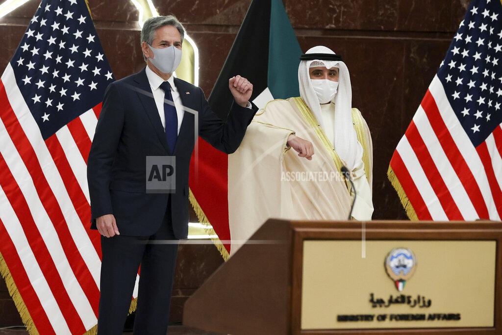 Jonathan Ernst Kuwaiti Foreign Minister Sheikh Ahmad Nasser Al-Mohammad Al-Sabah and U.S. Secretary of State Antony Blinken arrive for a joint news conference at the Ministry of Foreign Affairs in Kuwait City, Kuwait, Thursday, July 29, 2021. (Jonathan Ernst/Pool via AP)