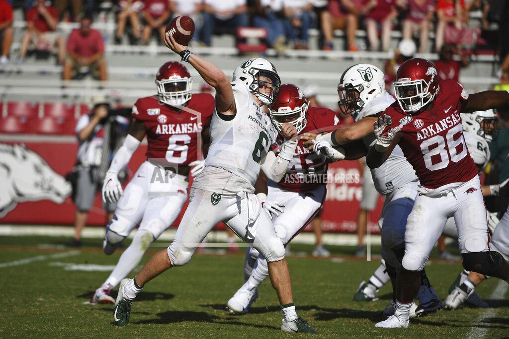 Michael Woods Portland State's Davis Alexander throws a pass against Arkansas during the second half of an NCAA college football game Saturday, Aug. 31, 2019, in Fayetteville, Ark. (AP Photo/Michael Woods)