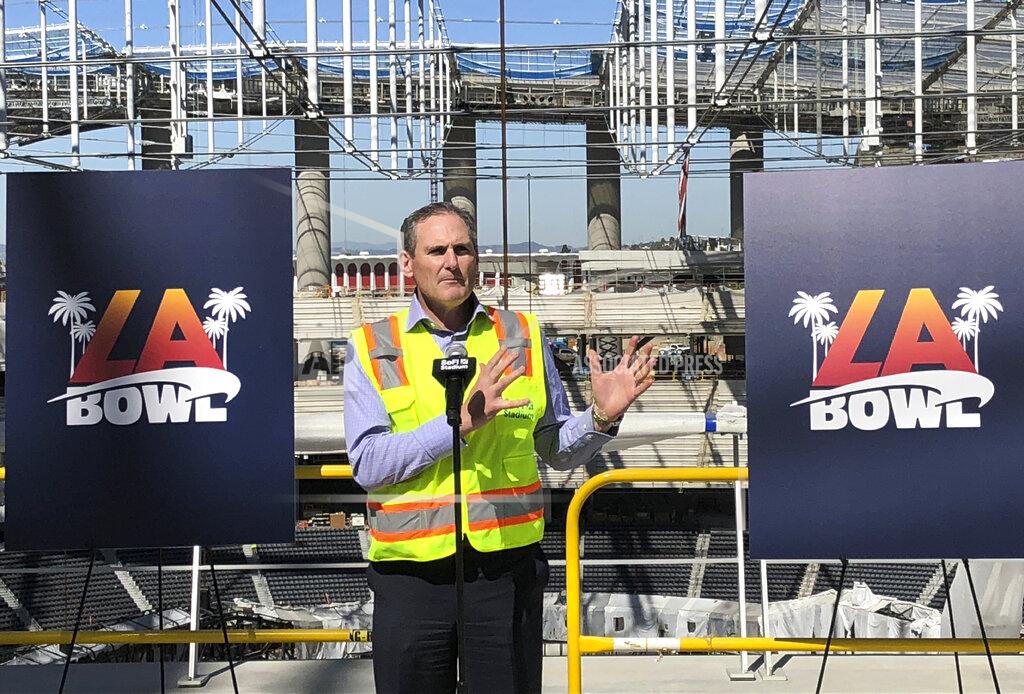 Greg Beacham Pac-12 Commissioner Larry Scott speaks Wednesday, Feb. 26, 2020, about the new college football bowl game to be held at SoFi Stadium in Inglewood, Calif. The LA Bowl will match opponents from the Pac-12 and Mountain West conferences in December at the multibillion-dollar stadium, which is scheduled to open in July. (AP Photo/Greg Beacham)
