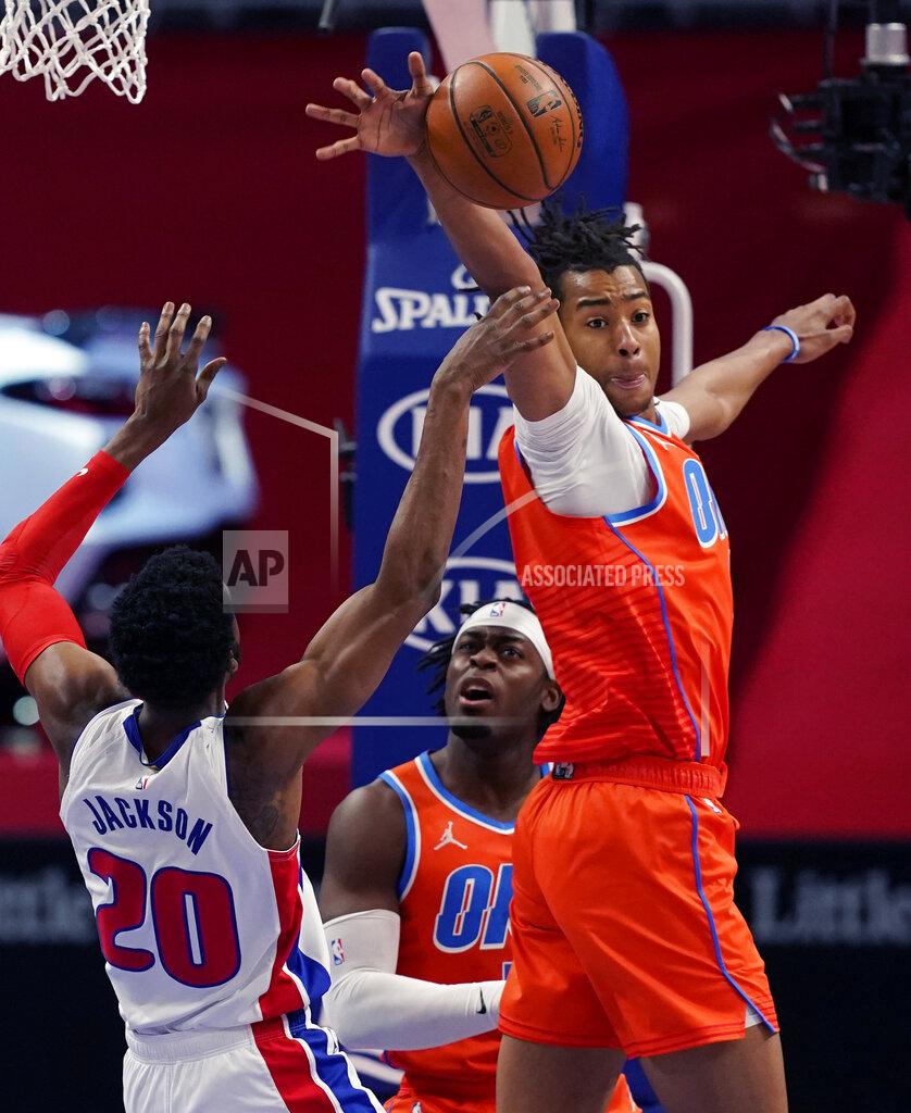 Carlos Osorio Oklahoma City Thunder center Moses Brown blocks a shot by Detroit Pistons guard Josh Jackson (20) during the first half of an NBA basketball game, Friday, April 16, 2021, in Detroit. (AP Photo/Carlos Osorio)