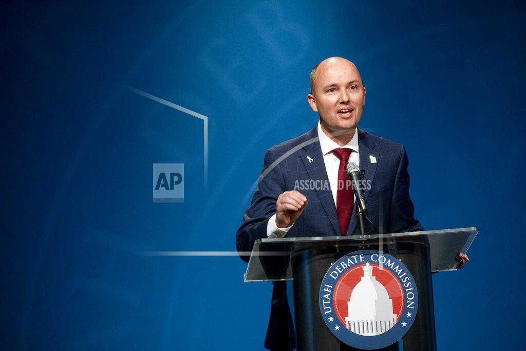 In this Monday, June 1, 2020, photo, Utah Lt. Gov. Spencer Cox speaks during the Utah Gubernatorial Republican Primary Debate, in Salt Lake City. Cox, known for his earnest grin and quirky Twitter feed, argued that he's been doing his job by leading the state's coronavirus task force. He touted the approach of his boss, Republican Gov. Gary Herbert, who made his stay-home order voluntary and moved early to reopen the economy. "We've done it ... as well or better than any other state in this nation," he said. (Ivy Ceballo/Deseret News, via AP, Pool)