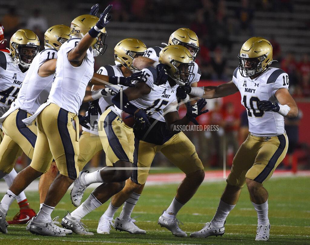 Eric Christian Smith Navy safety Noruwa Obanor (15) celebrates his fumble recovery during the first half of an NCAA college football game against Houston, Saturday, Nov. 30, 2019, in Houston. (AP Photo/Eric Christian Smith)