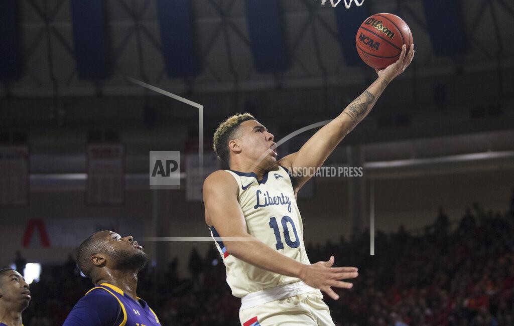 Lee Luther Jr. Liberty guard Elijah Coffee (120) drives to basket against Lipscomb during the first half of the Atlantic Sun conference NCAA basketball championship game in Lynchburg, Va., Sunday, March 8, 2020. (AP Photo/Lee Luther Jr.)