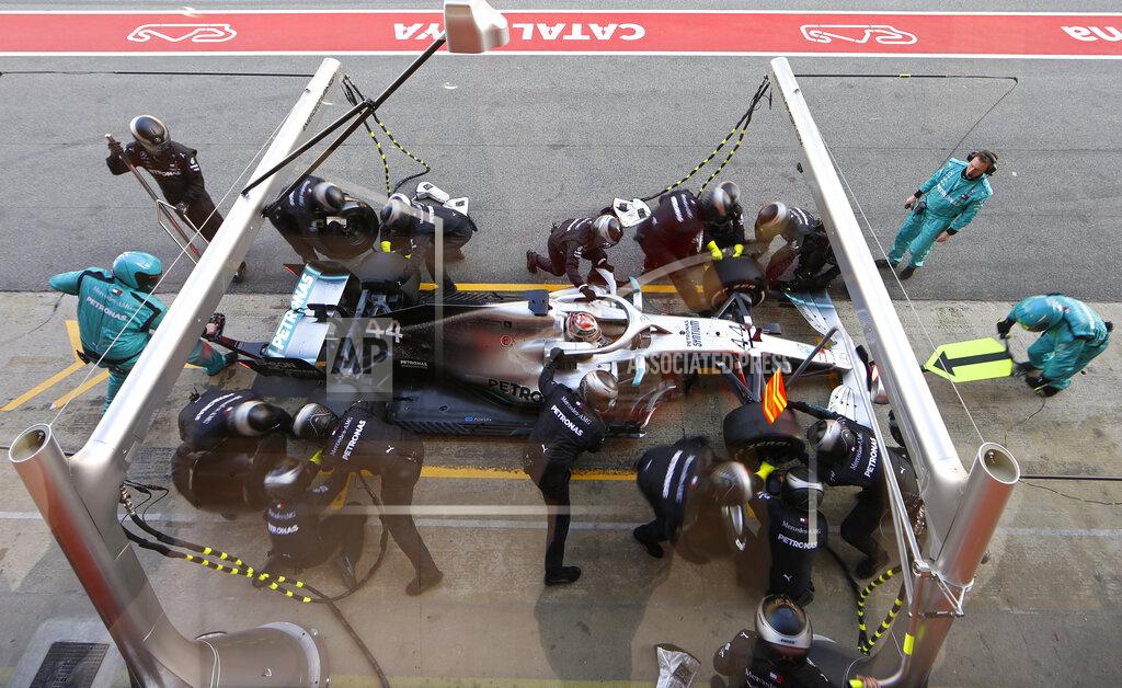 Joan Monfort Mercedes driver Lewis Hamilton of Britain makes a pit stop during a Formula One pre-season testing session at the Barcelona Catalunya racetrack in Montmelo, outside Barcelona, Spain, Wednesday, Feb. 27, 2019. (AP Photo/Joan Monfort)