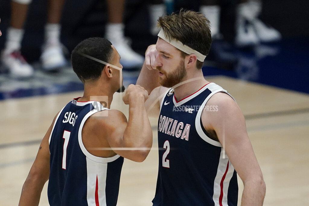 Jeff Chiu Gonzaga guard Jalen Suggs (1) celebrates with forward Drew Timme (2) during the second half of the team's NCAA college basketball game against Saint Mary's in Moraga, Calif., Saturday, Jan. 16, 2021. (AP Photo/Jeff Chiu)