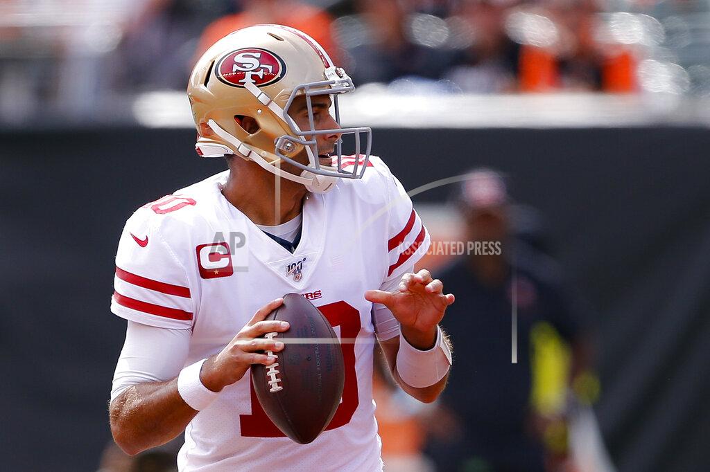 Gary Landers San Francisco 49ers quarterback Jimmy Garoppolo looks to pass during the first half an NFL football game against the Cincinnati Bengals, Sunday, Sept. 15, 2019, in Cincinnati. (AP Photo/Gary Landers)