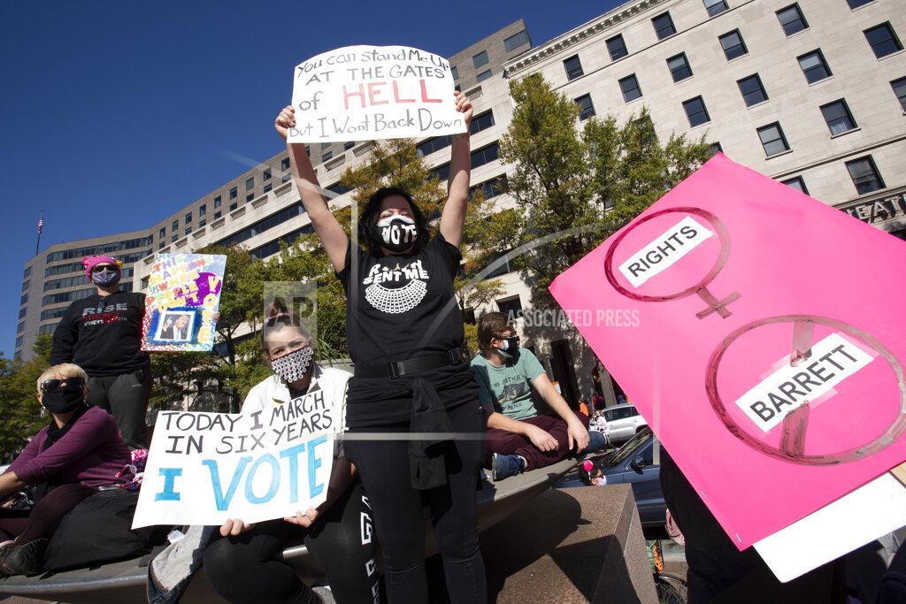 Jose Luis Magana Demonstrators rally during the Women's March at Freedom Plaza, Saturday, Oct. 17, 2020, in Washington. (AP Photo/Jose Luis Magana)