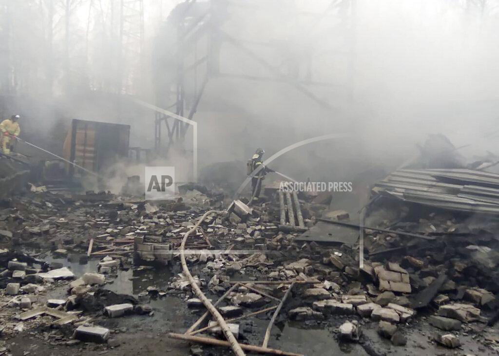 Uncredited In this photo released by Russian Emergency Ministry Press Service, emergency personnel work at the site of an explosion and fire at a gunpowder factory in the Ryazan region, about 270 kilometers (about 167 miles) southeast of Moscow, Russia, Friday, Oct. 22, 2021. Russian emergency officials say that at least seven people have died and a further nine are missing following an explosion and fire at a gunpowder factory. (Ministry of Emergency Situations press service via AP)