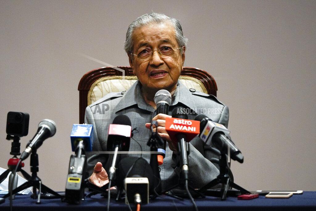 Vincent Thian Malaysia former Prime Minister Mahathir Mohamad speaks during a press conference at his office of Perdana Foundation in Putrajaya, Malaysia Monday, May 18, 2020. Mahathir slammed the government for using the pandemic as an excuse to block parliament from sitting. The king in his speech urged lawmakers not to stir up another political crisis but to focus on the people's welfare amid the virus outbreak. (AP Photo/Vincent Thian)