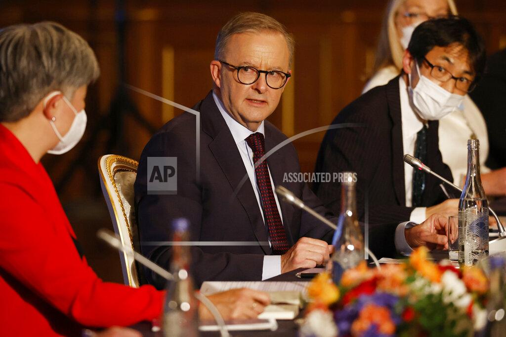 Issei Kato Australian Prime Minister Anthony Albanese, center, flanked by Foreign Minister Penny Wong, left, attends a bilateral meeting with Japanese Prime Minister Fumio Kishida (not seen), alongside the Quad leaders' summit, between the United States, Japan, India and Australia, at the Akasaka Palace state guest house in Tokyo, Tuesday, May 24, 2022. (Issei Kato/Pool Photo via AP)