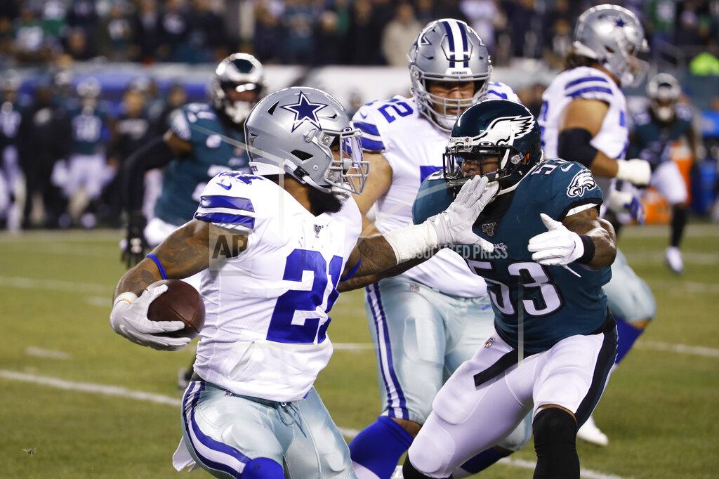Chris Szagola Philadelphia Eagles' Nigel Bradham (53) tries to stop Dallas Cowboys running back Ezekiel Elliott (21) during the first half of an NFL football game Sunday, Dec. 22, 2019, in Philadelphia. (AP Photo/Chris Szagola)