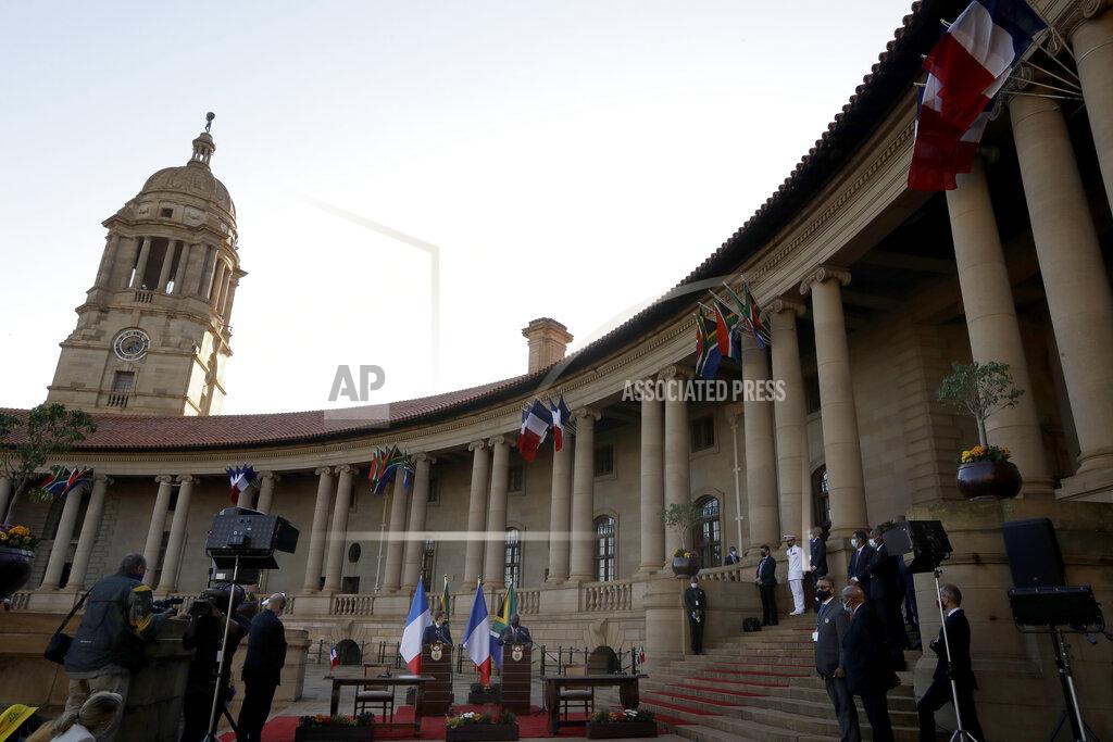 Themba Hadebe South African President Cyril Ramaphosa, and his French counterpart Emmanuel Macron attend a press conference at the government's Union Building, in Pretoria, South Africa, Friday, May 28, 2021. Macron is on a two-day official visit to the country. (AP Photo/Themba Hadebe, Pool)