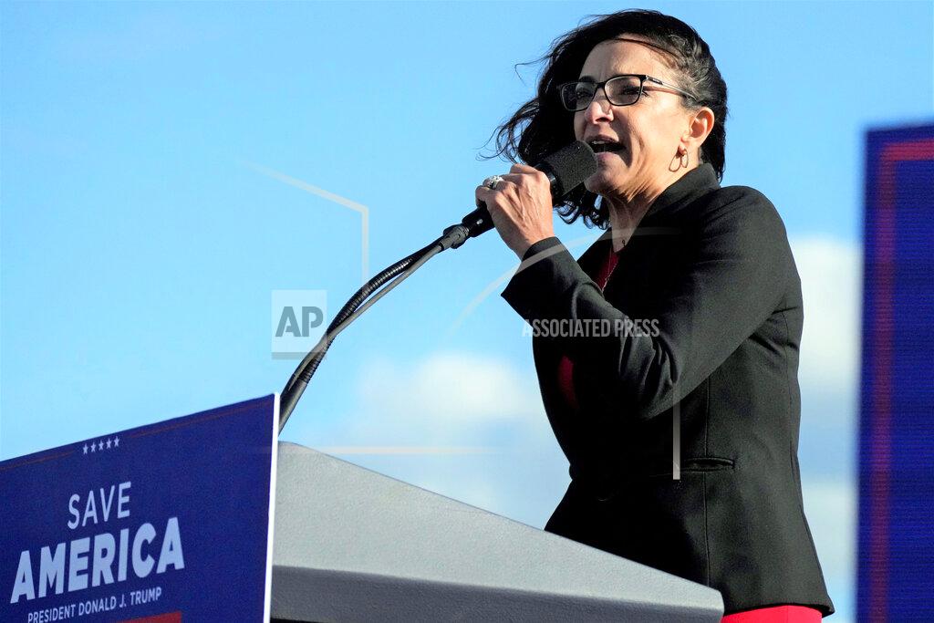 Meg Kinnard Former South Carolina state lawmaker Katie Arrington speaks at a rally ahead of an appearance by former President Donald Trump on Saturday, March 12, 2022, in Florence, S.C. Arrington — now making a second congressional bid — says a dispute over her access to top-secret government information has been part of a politically motivated smear campaign tied to her support of former President Donald Trump. (AP Photo/Meg Kinnard)