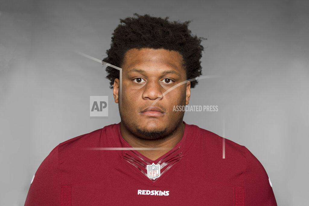 Uncredited FILE - This is a 2019 file photo showing Ereck Flowers of the Washington Redskins NFL football team. Offensive lineman Ereck Flowers has agreed to terms on a $30 million, three-year contract with the Miami Dolphins, Monday, March 16, 2020. The deal was confirmed by Flowers’ agent, Drew Rosenhaus, who said $19.95 million is guaranteed.(AP Photo/File)
