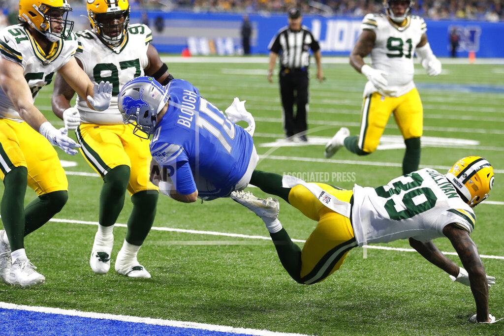 Carlos Osorio Detroit Lions quarterback David Blough (10) flips over Green Bay Packers defensive back Chandon Sullivan (39) at the 1-yard line during the first half of an NFL football game, Sunday, Dec. 29, 2019, in Detroit. (AP Photo/Carlos Osorio)