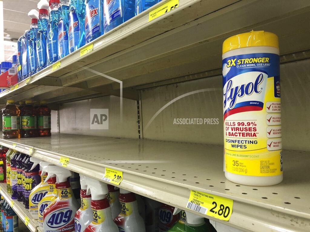 Joshua L. Jones FILE - This March 13, 2020, file photo shows a package of Lysol disinfectant wipes on a shelf at a store in Athens, Ga. Lysol is for toilet bowls and countertops, not human consumption. The company that manufacturers it felt compelled to emphasize the danger of ingesting it after President Donald Trump’s musings about heat, light and disinfectant in the time of coronavirus. (Joshua L. Jones/Athens Banner-Herald via AP)