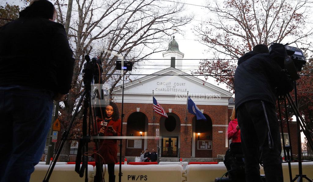 Steve Helber Television crews do stand up in front of court for the trial of James Alex Fields Jr., in Charlottesville General District Court in Charlottesville, Va., Monday, Nov. 26, 2018. Jury selection lasted throughout the day. (AP Photo/Steve Helber)