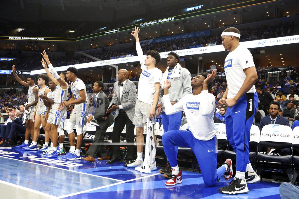 Memphis' James Wiseman (second from right) goes down on his knees as he and his teammates celebrate a basket in the second half of an NCAA college basketball game against Alcorn State Saturday, Nov. 16, 2019, in Memphis, Tenn. (AP Photo/Karen Pulfer Focht)
