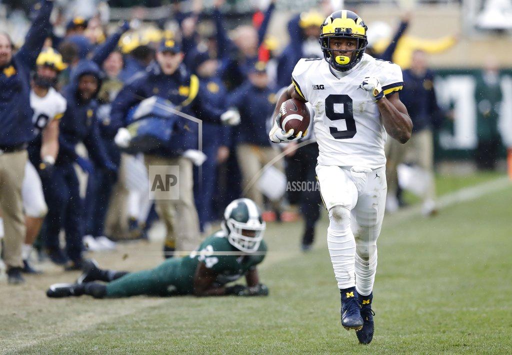 Carlos Osorio Michigan wide receiver Donovan Peoples-Jones (9) runs for a 79-yard touchdown run during the second half of an NCAA college football game against Michigan State, Saturday, Oct. 20, 2018, in East Lansing, Mich. (AP Photo/Carlos Osorio)