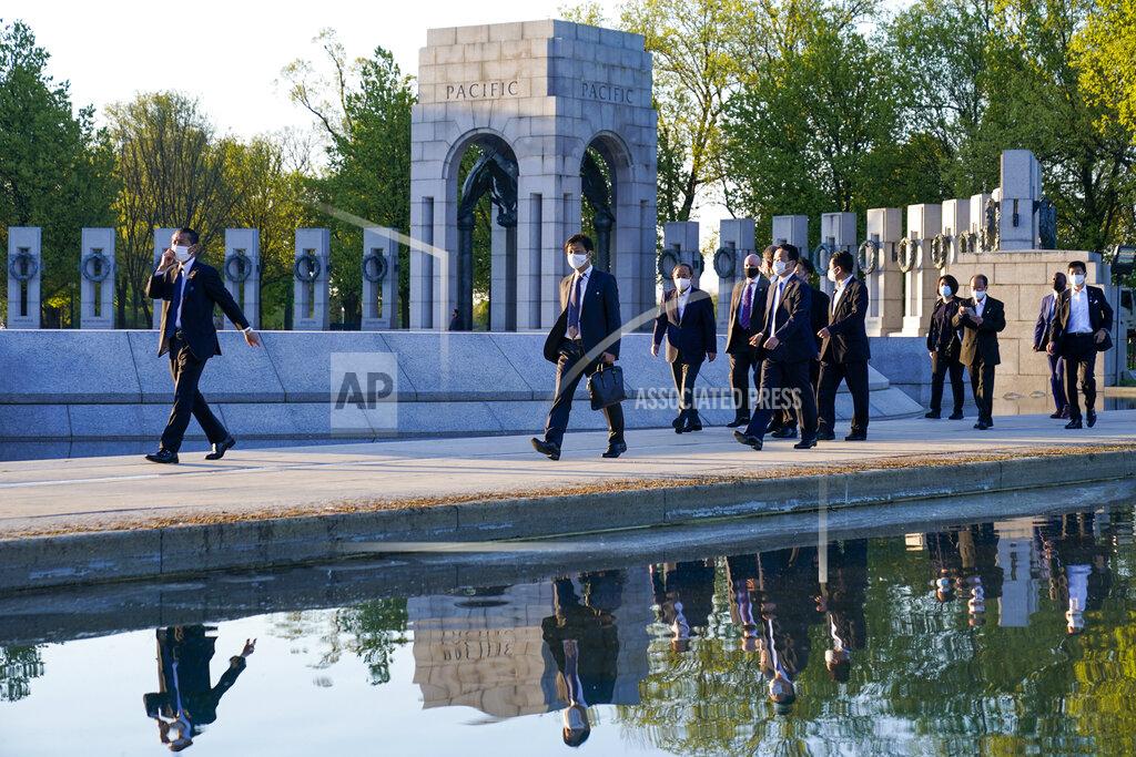 Alex Brandon Japanese Prime Minister Yoshihide Suga visits the World War II Memorial, Saturday, April 17, 2021, in Washington. (AP Photo/Alex Brandon)