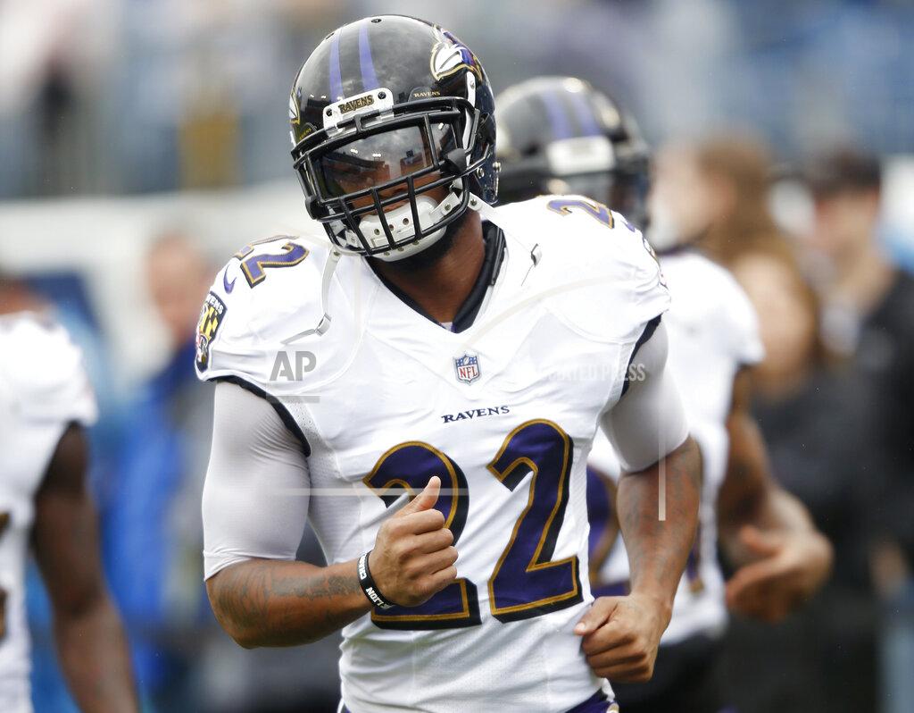 Wade Payne FILE - In this Oct. 14, 2018, file photo, Baltimore Ravens cornerback Jimmy Smith warms up before an NFL football game against the Tennessee Titans, in Nashville, Tenn. During a busy offseason, the Baltimore Ravens put a high priority on fortifying a secondary that last season played a huge role on the top-ranked defense in the NFL. That included retaining Jimmy Smith. (AP Photo/Wade Payne)