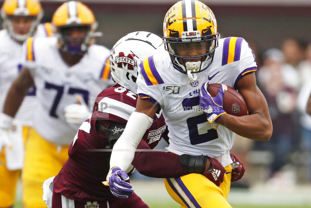 Rogelio V. Solis LSU wide receiver Justin Jefferson (2) tries to fight off a tackle by Mississippi State safety Brian Cole II (32) after a pass reception during the first half of their NCAA college football game in Starkville, Miss., Saturday, Oct. 19, 2019. (AP Photo/Rogelio V. Solis)