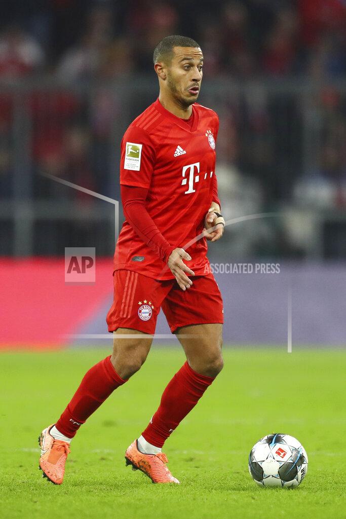 Matthias Schrader FILE -- In this Saturday, Nov. 30, 2019 file photo Bayern's Thiago controls the ball during the German Bundesliga first devision soccer match between FC Bayern Munich and Bayer Leverkusen 04 in Munich, Germany. Thiago Alcantara is joining Liverpool after ending his seven-year stint at European champion Bayern Munich. (AP Photo/Matthias Schrader, file)