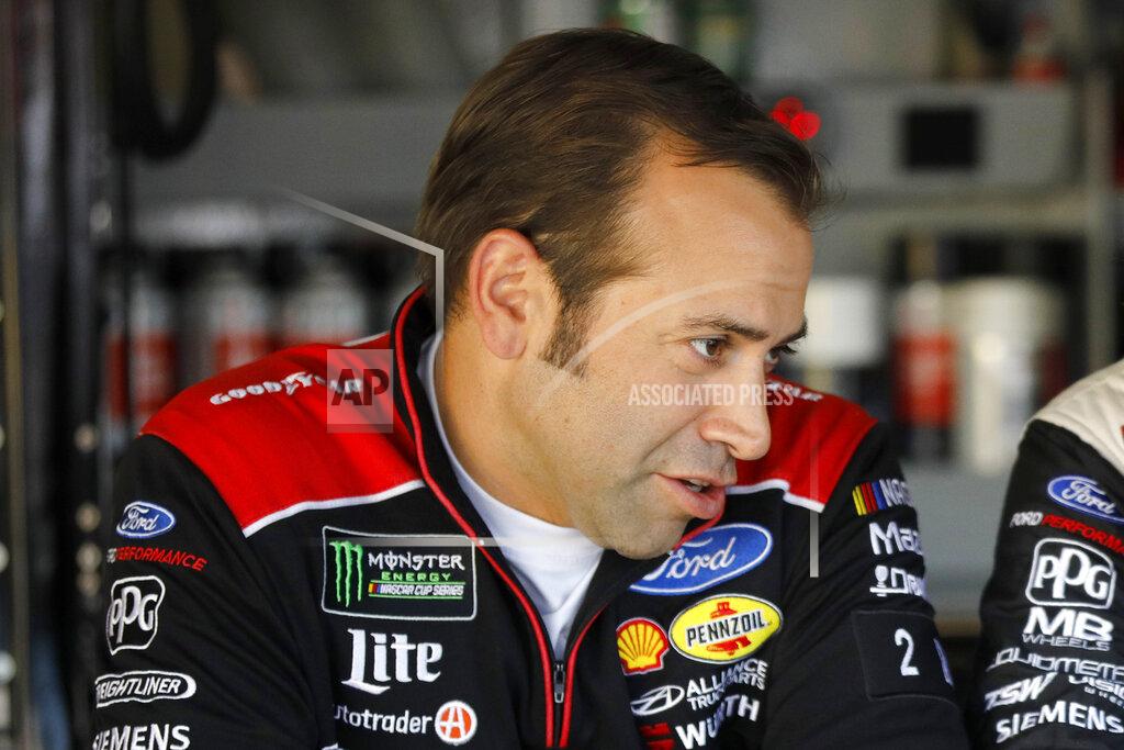 Colin E. Braley FILE - In this Oct. 18, 2019, file photo, NASCAR crew chief Paul Wolfe talks in the garage area at Kansas Speedway in Kansas City, Kan. The pressure will be intense for crew chiefs in NASCAR's championship race. There is no practice or qualifying under COVID-19 protocols, so the team leaders must be on top of their game. (AP Photo/Colin E. Braley, File)