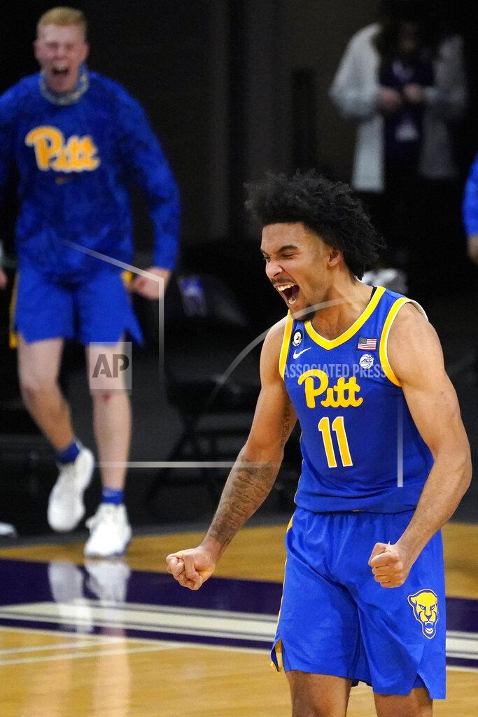 Nam Y. Huh Pittsburgh guard/forward Justin Champagnie (11) reacts after scoring a basket against Northwestern during the second half of an NCAA college basketball game in Evanston, Ill., Wednesday, Dec. 9, 2020. Pittsburgh won 71-70. (AP Photo/Nam Y. Huh)