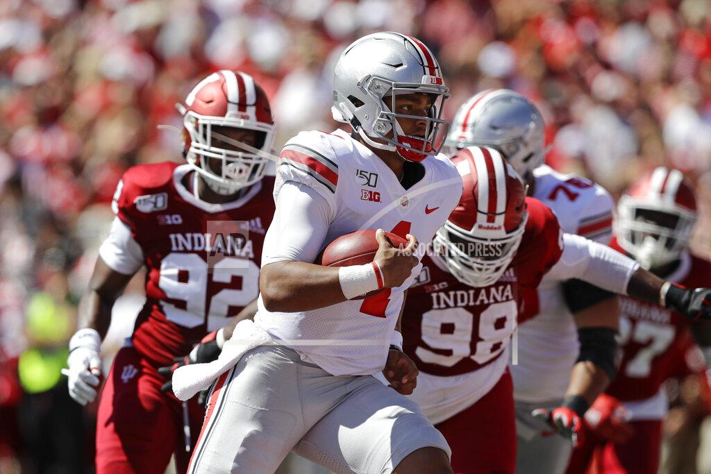 Darron Cummings Ohio State quarterback Justin Fields (1) runs for a touchdown during the first half of an NCAA college football game against Indiana, Saturday, Sept. 14, 2019, in Bloomington, Ind. (AP Photo/Darron Cummings)