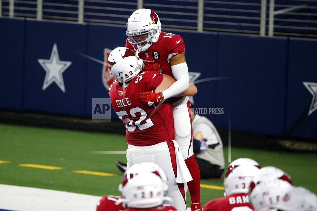 Michael Ainsworth Arizona Cardinals' Mason Cole (52) and Christian Kirk (13) celebrate a touchdown scored by Kirk in the first half of an NFL football game against the Dallas Cowboys in Arlington, Texas, Monday, Oct. 19, 2020. (AP Photo/Michael Ainsworth)